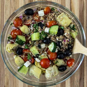 Quinoa and Lentil Salad in a glass bowl.