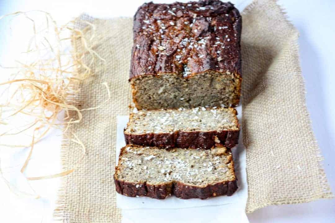 A banana loaf partly sliced