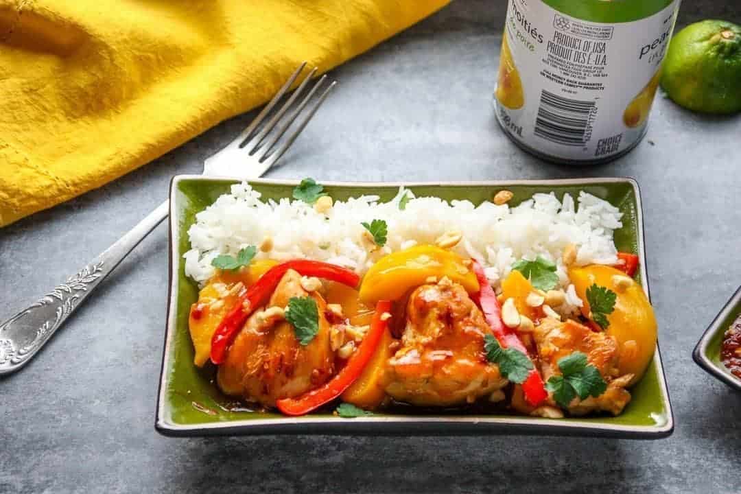 A plate of food on a table, with Peach and Chicken