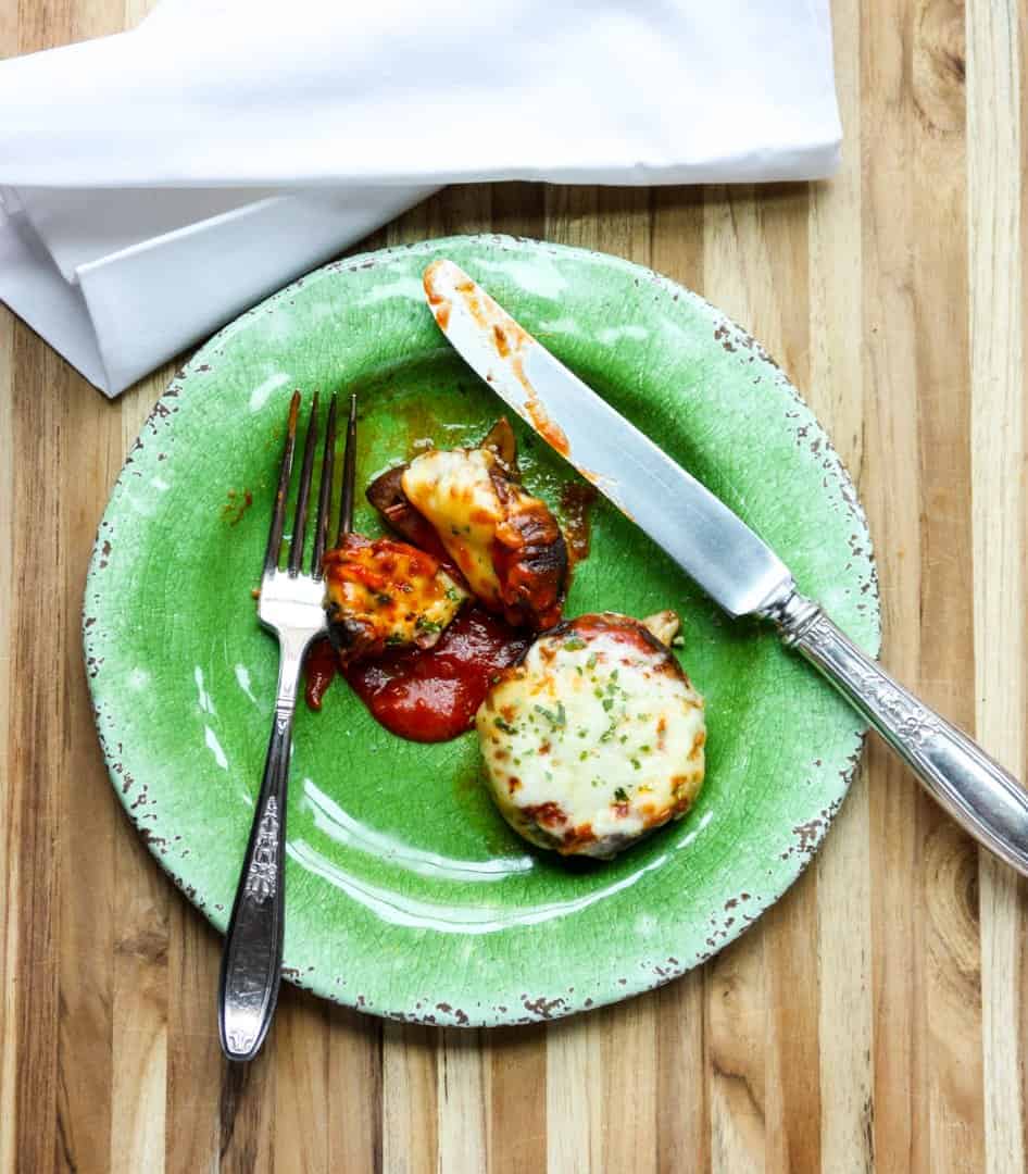 A plate of food sitting on top of a wooden table