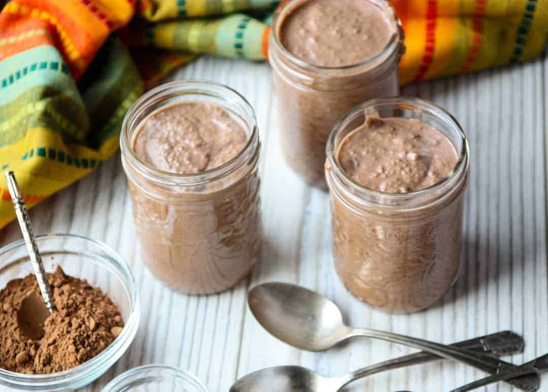Jars of pudding on a table