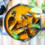 A pot of shellfish in broth