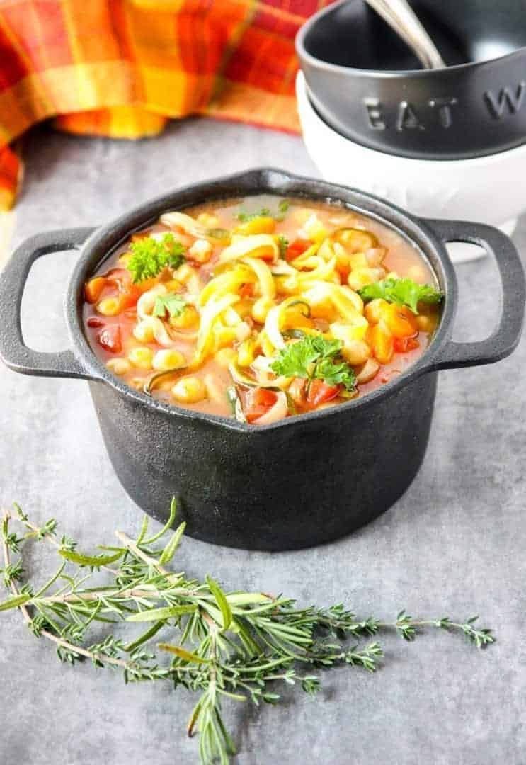 Vegetable Zucchini Noodle Soup in Pot with two bowls ready for serving
