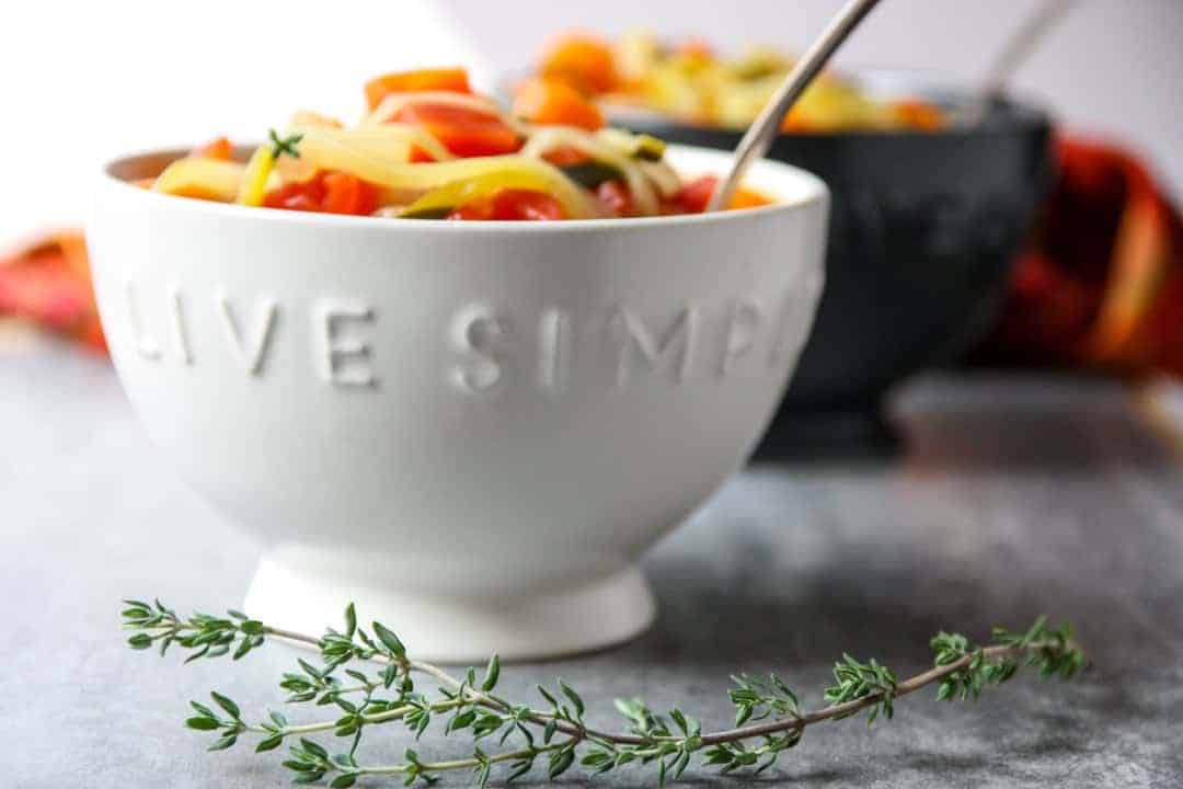A close up of a bowl, with Soup 