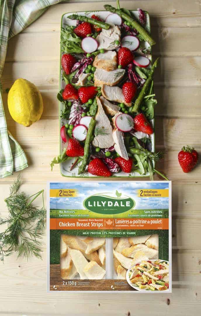 Several different types of food on a table, with Salad and Feta