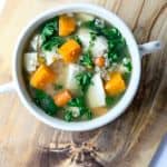 A bowl of soup on a table