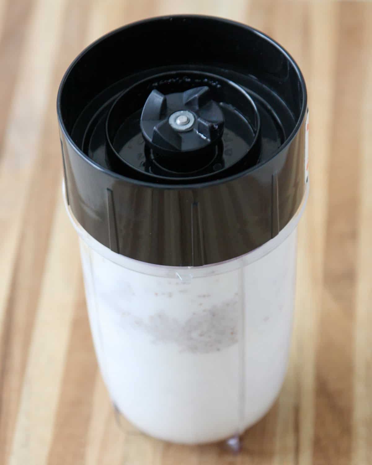 The recipe ingredients in a blender.