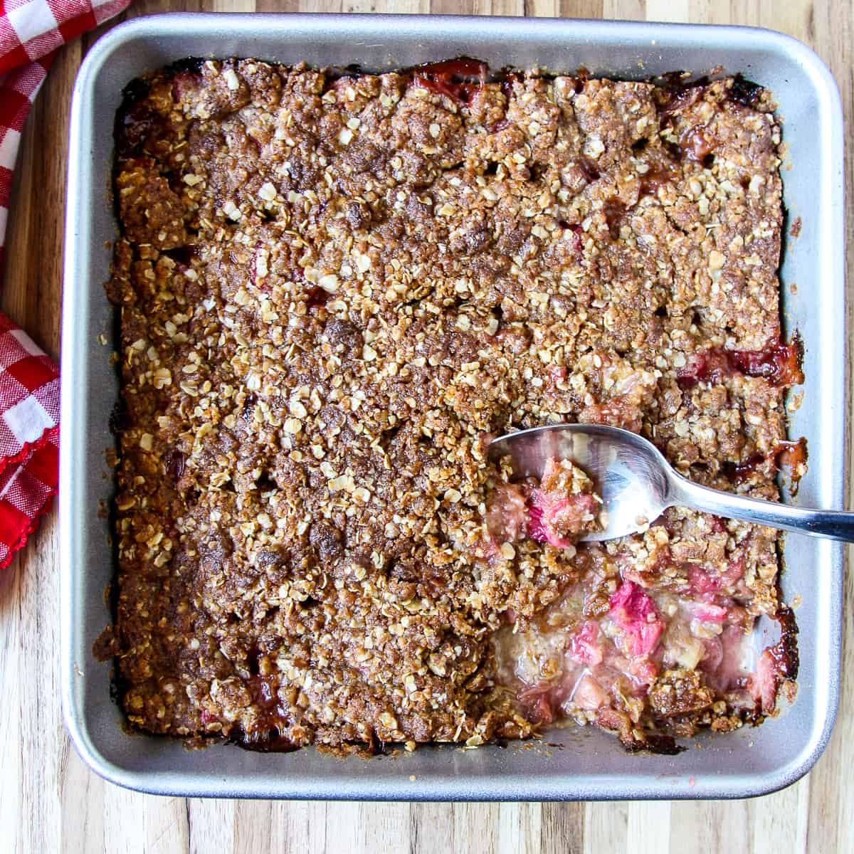 Fully baked rhubarb crisp in the baking pan.