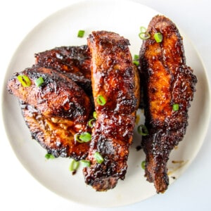 Air fryer country style ribs covered in barbecue sauce.