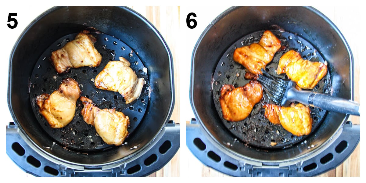The chicken in the air fryer basket being brushed with teriyaki sauce in the final minutes of cooking.