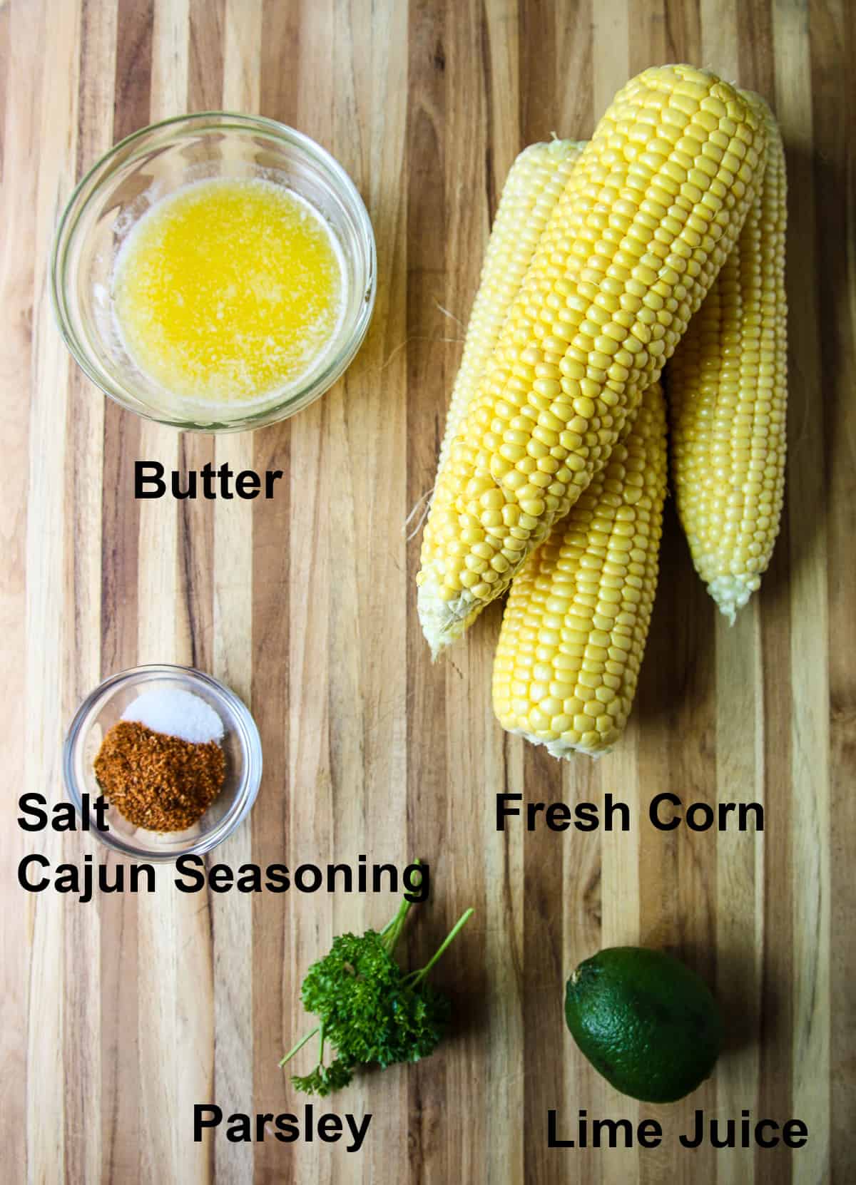 The ingredients require to make this recipe on a wooden board.
