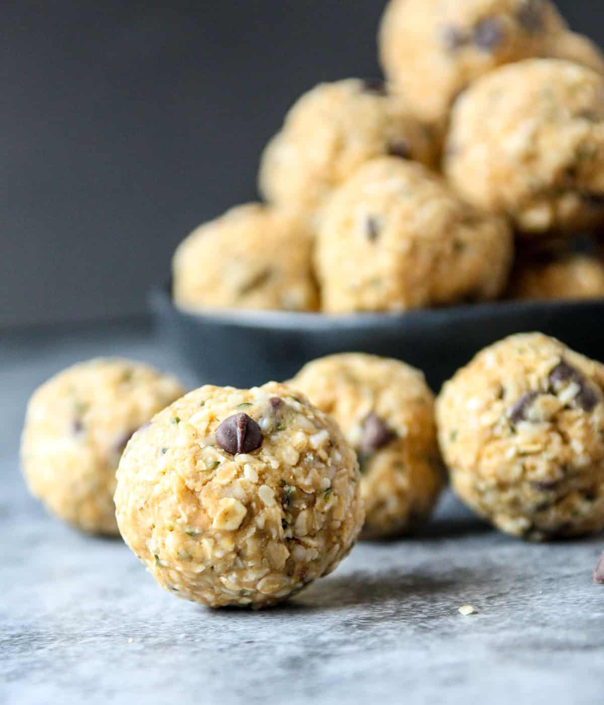 Oatmeal energy bites on a stone countertop.