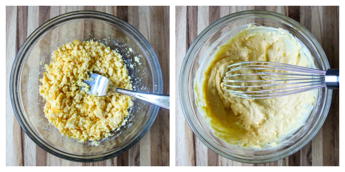 Cooked egg yolks in a glass bowl being mashed and mixed.