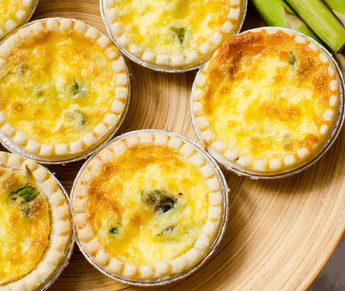 Bacon asparagus tarts on a plate.