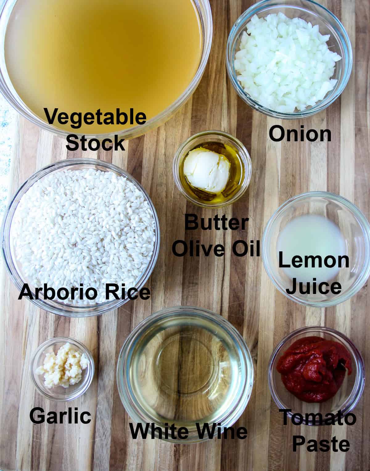 Ingredients for making the risotto in glass bowls.