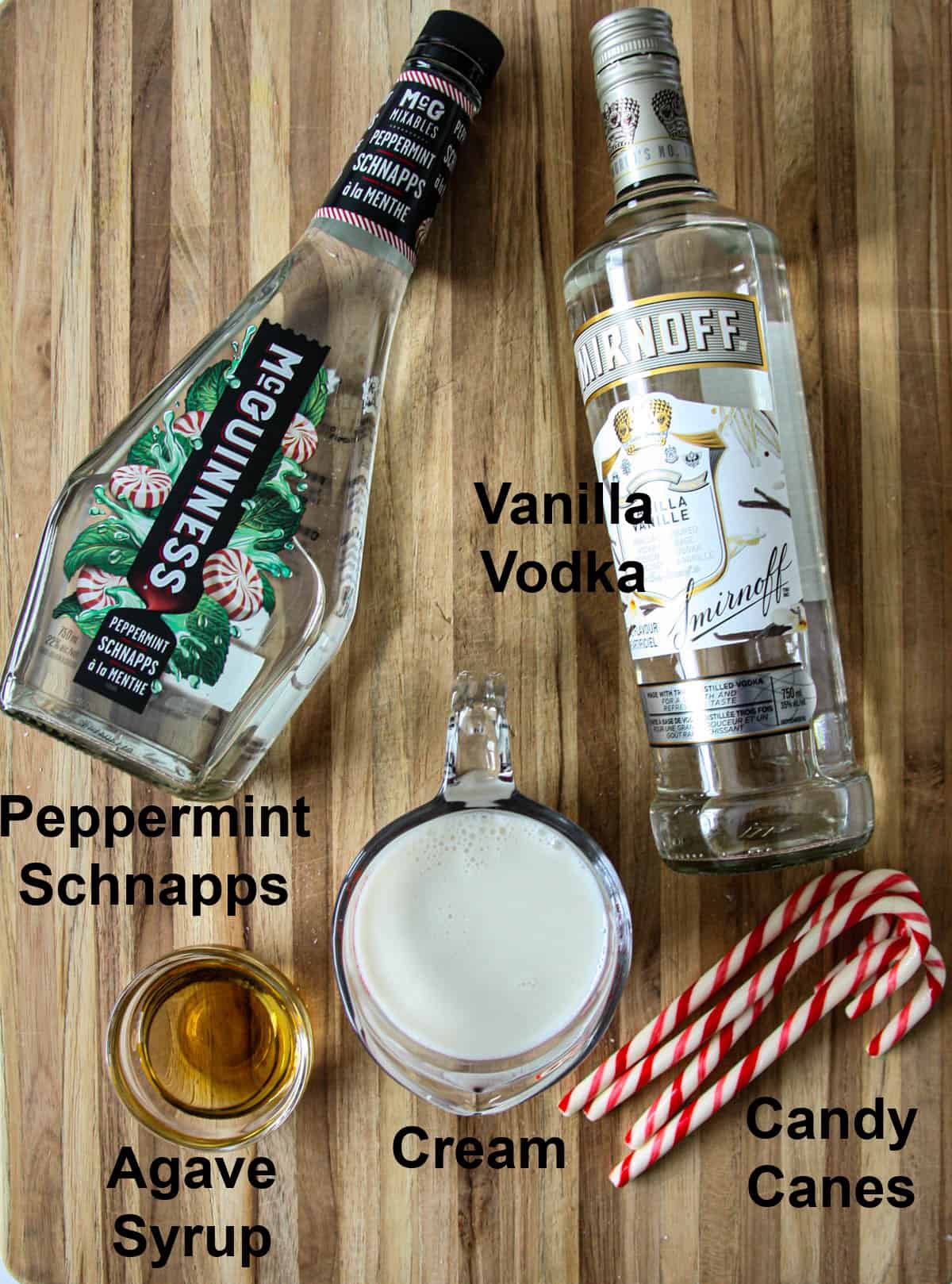 The ingredients for making this cocktail on a wooden board.